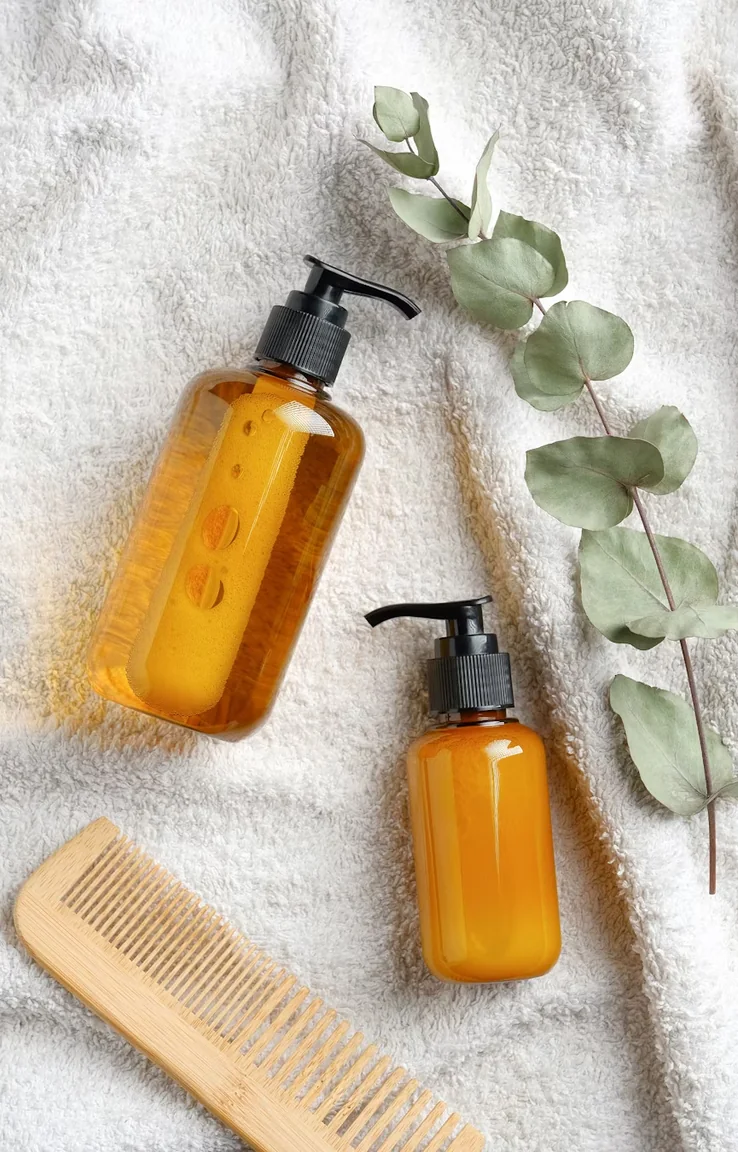 Natural skincare and beauty products styled on linen